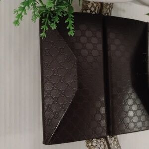 Gucci Leather Foldable Monogrammed Eye/Sun Glass Case. Brown in color.